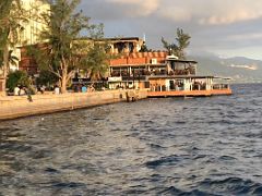 04C Victoria Pier was renovated in 2018 and now houses eight popular brands including Glorias Seafood City and Devon House I Scream waterfront just before sunset Kingston Jamaica